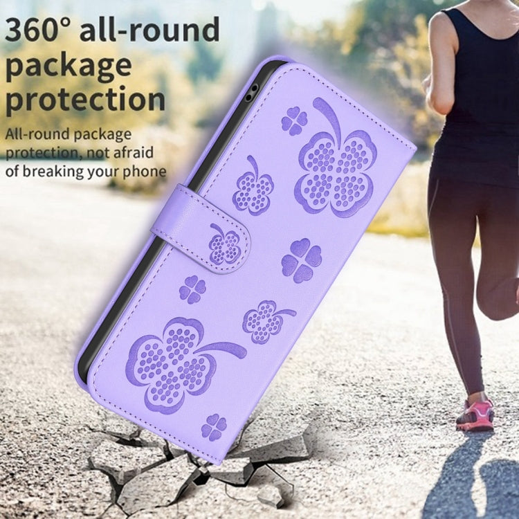 For iPhone 15 Pro Max Four-leaf Embossed Leather Phone Case(Purple) - HoMEdemic™ 
