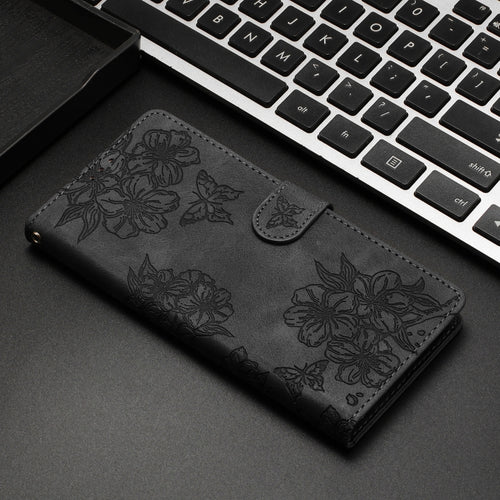 For iPhone 15 Pro Max Cherry Blossom Butterfly Skin Feel Embossed PU Phone Case(Black) - HoMEdemic™ 