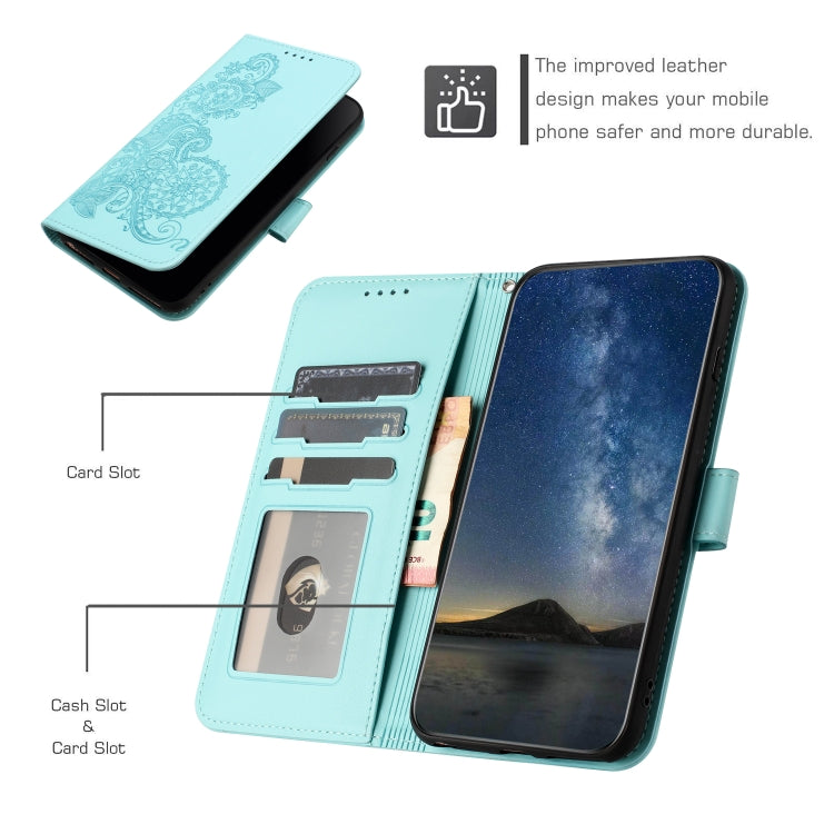 For iPhone 15 Pro Datura Flower Embossed Flip Leather Phone Case(Light blue) - HoMEdemic™ 