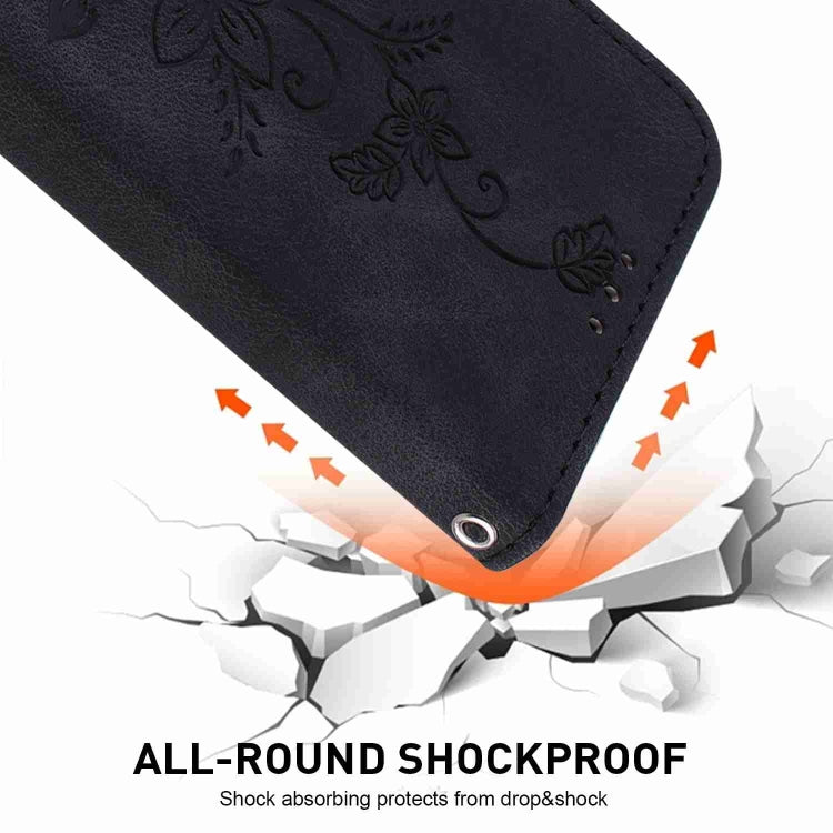 For iPhone 15 Pro Lily Embossed Leather Phone Case(Black) - HoMEdemic™ 