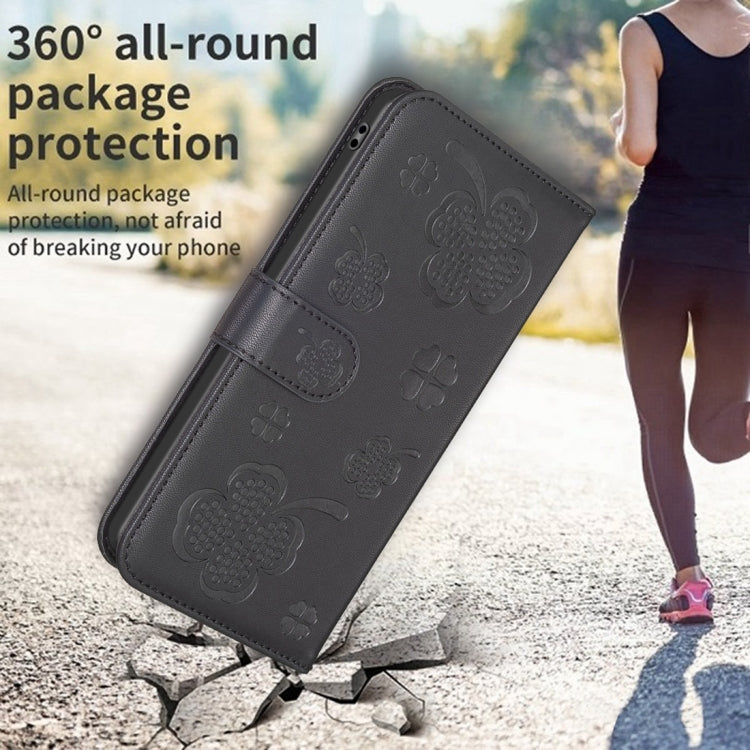 For iPhone 15 Pro Max Four-leaf Embossed Leather Phone Case(Black) - HoMEdemic™ 